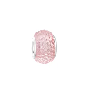 Close-up of pink pavé crystal resin bead with silver core for DIY jewelry