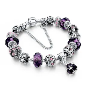 Silver snake chain bracelet with purple crystal charms and pink rhinestone beads