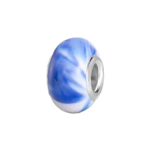 Detailed view of blue and white resin bead with metal core for DIY charm bracelets