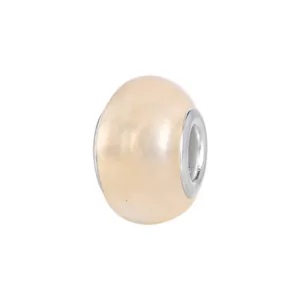 Macro detail of beige faux opal bead with silver metal core for DIY charm bracelets