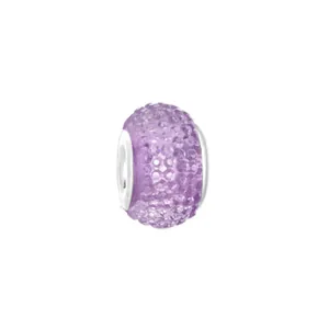 Macro shot of purple faceted crystal charm with silver hollow core for bead bracelets