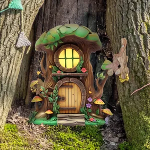 Detailed fairy tale mushroom house ornament with arched wooden door and glowing window