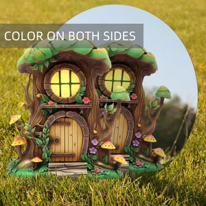 Detail of mushroom tree house garden stake showing double-sided color on green lawn