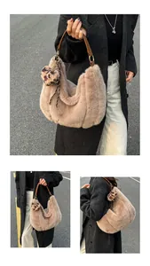 Detail view of plush tote bag with faux fur texture, leather handles and heart pendant