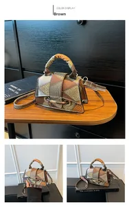 Detail of vintage square crossbody bag with brown and grey geometric patchwork leather