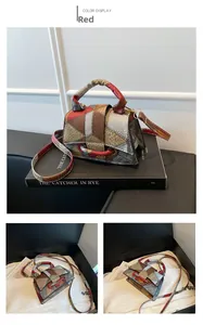 Close-up of color-block hourglass bag with crocodile embossed texture and metal hardware