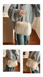 Detailed macro view of plush beige faux fur texture with pearl chain and leather handle