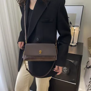 Retro dark brown leather crossbody square bag with golden U-shaped lock and metal chain