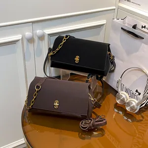 Minimalist square chain bags with U-shaped gold buckles in black and dark brown
