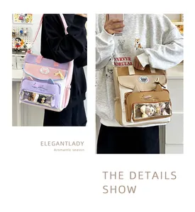 Detail of ita bag featuring a transparent PVC window for plush doll display and cute cat ears
