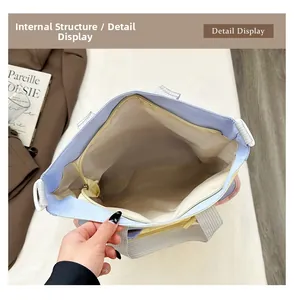 Detailansicht der Canvas-Tasche mit gelbem Innenfutter und Reißverschlussfach