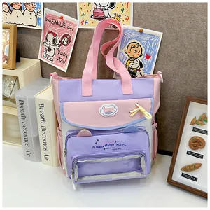 Detailed view of the multi-pocket pastel tote bag with transparent display window