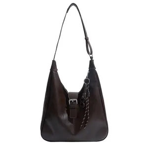 Retro large brown hobo bag with adjustable strap and textured faux leather finish