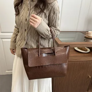 Brown crocodile embossed tote bag with top handle, elegant vintage style for women