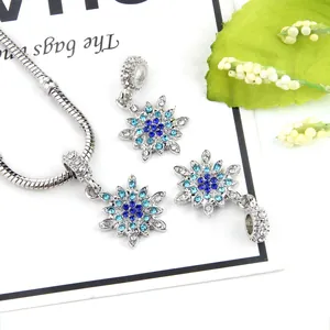 Silver snowflake charm bracelet set with blue zircon and snake chain for women