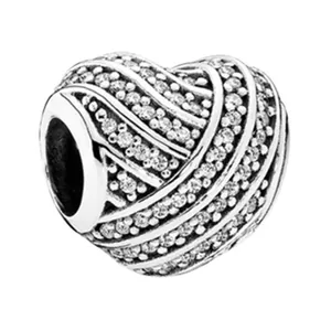 S925 sterling silver heart charm with pave set cubic zirconia and ocean wave texture
