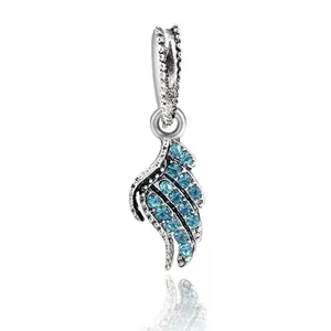 Detailed view of silver wing pendant with sky blue cubic zirconia for DIY jewelry