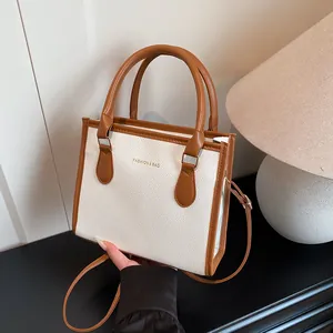 Borsa a mano retrò bicolore con tracolla regolabile e scritta Fashion & Bag in oro