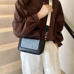 Contrast stitching crossbody bag for women with wide fabric strap and leather panels