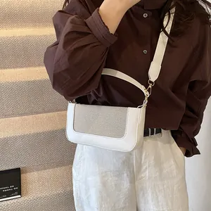 White PU small square bag with fine mesh texture and detachable wide fabric shoulder strap