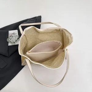 Large beige woven straw tote bag with inner pouch for summer beach and commute