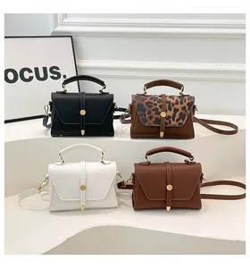 Collection of chic square handbags in leopard print, black, brown and white leather finishes