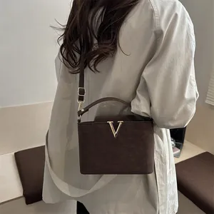 Retro dark brown large square tote bag with vintage texture and gold V-shaped metal buckle