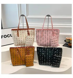 Set of four vintage print tote bags in beige pink brown and black with mini pouches