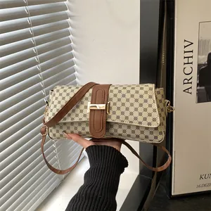 Retro small square crossbody bag with vintage print and golden H buckle detail
