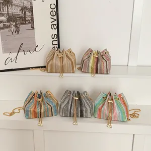 Rainbow woven bucket bag with pearl drawstring and golden chain strap in various colors