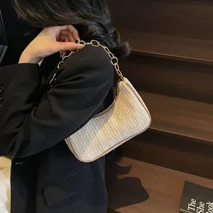 Fashionable beige straw crescent shoulder bag with chunky gold chain for women