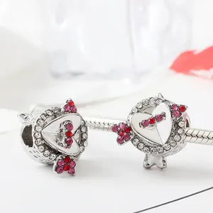 Cupid's arrow heart bead charm in silver with red and pink crystals for snake chains