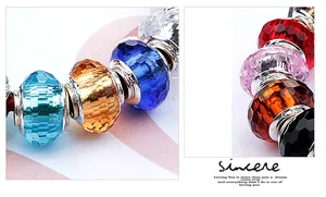 Macro shot of colorful faceted crystal charms with S925 engraved silver cores