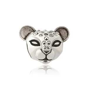 Detailed view of silver cheetah animal bead with vintage finish and black enamel eyes