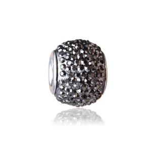 Detailed macro view of dark grey rhinestone paved large hole beads for DIY bracelets