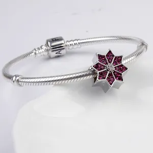 Pulsera de plata estilo serpiente con dije de estrella lila y cierre de barril