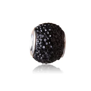 Macro shot of black pavé crystal bead with silver core for DIY bracelet making