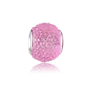 Pink resin candy crystal bead charm for DIY bracelet jewelry with reflective white background
