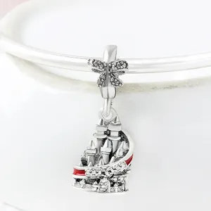 Silver castle charm with red enamel stripe and sparkling rhinestone bow hook on bracelet