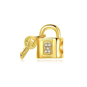 Golden lock and key pendant set with four diamonds and LOVE engraving for necklace
