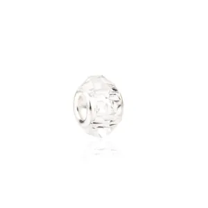 Macro view of transparent faceted crystal bead with a silver metal core for DIY bracelets
