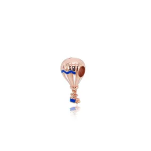 Hot air balloon charm in rose gold with blue and white enamel for DIY bracelets