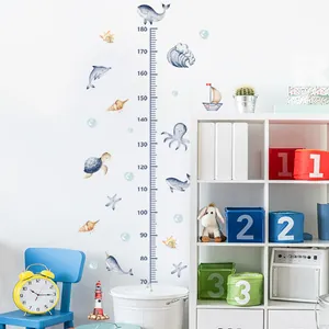 Cartoon ocean theme height growth chart for kids room with whale and turtle stickers