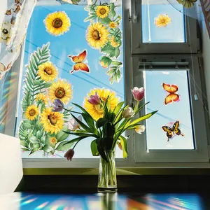Rainbow window stickers with sunflowers and butterflies creating colorful sun catchers