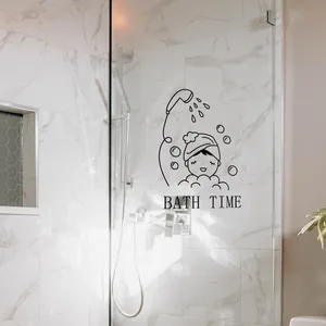 Minimalist black vinyl wall decal with BATH TIME text and cartoon kid for bathroom decor