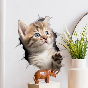 3D cartoon cat wall sticker with blue eyes and stripes breaking through white wall detail