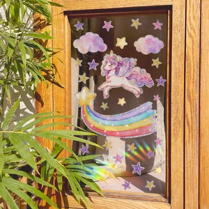 Rainbow unicorn and stars static window clings showing colorful light effects on glass