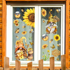 Bee gnome and sunflower window clings set on glass with sweet honey jar decorations