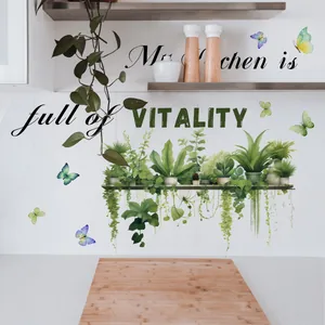 Detail of green plants and colorful butterflies wall decals with Vitality kitchen text