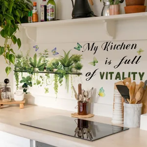 Detail of kitchen wall decals featuring potted plants, butterflies and vitality quotes